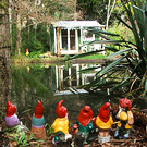 Gnomes Watching Cottage